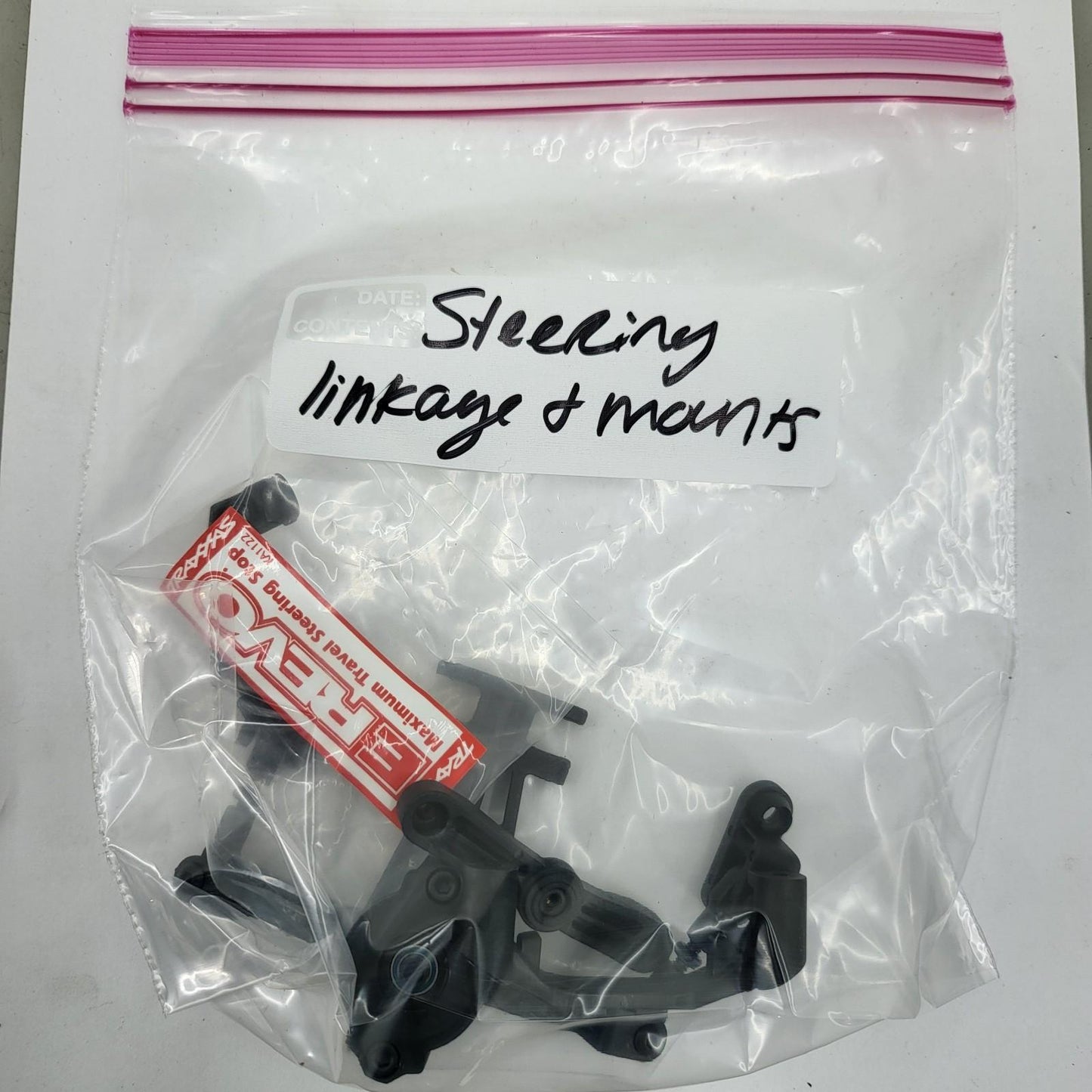 Traxxas Revo bell crank, steering linkage, mounts, new without package