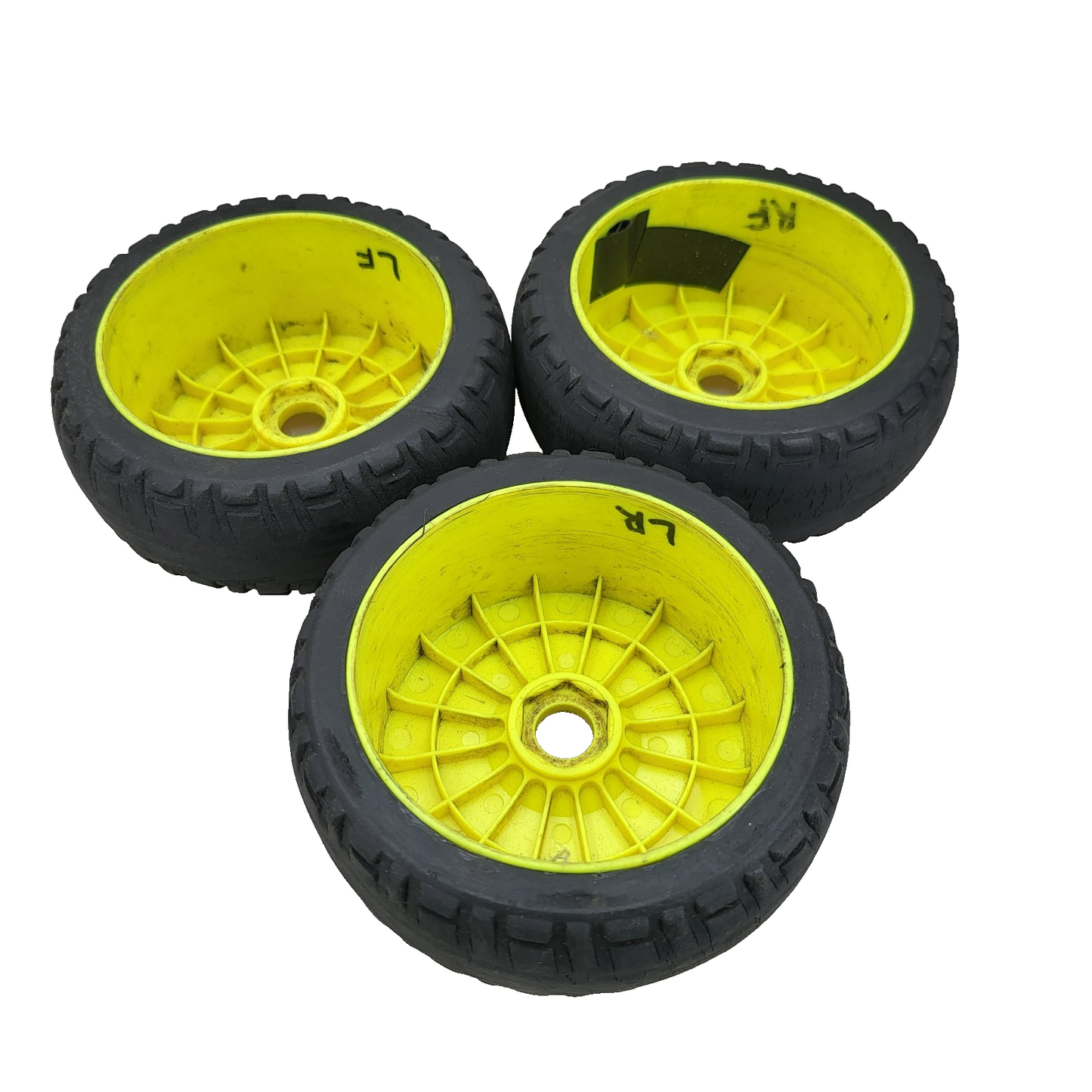 X3 1/10th scale yellow buggy wheels on worn unbranded tires