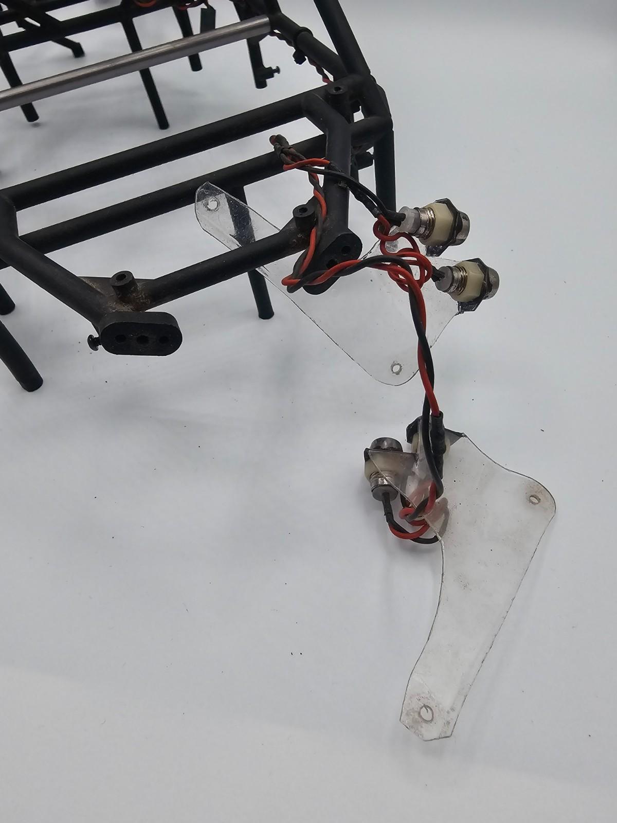 Axial Exo Terra roll-cage exoskeleton with LED head & tail lights, scratches