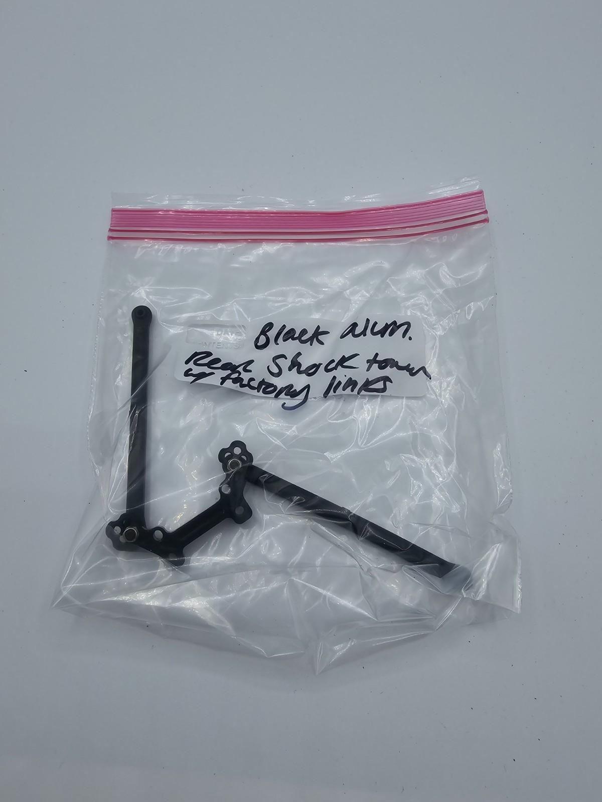 Axial Exo Terra rear black aluminum shock tower with original links