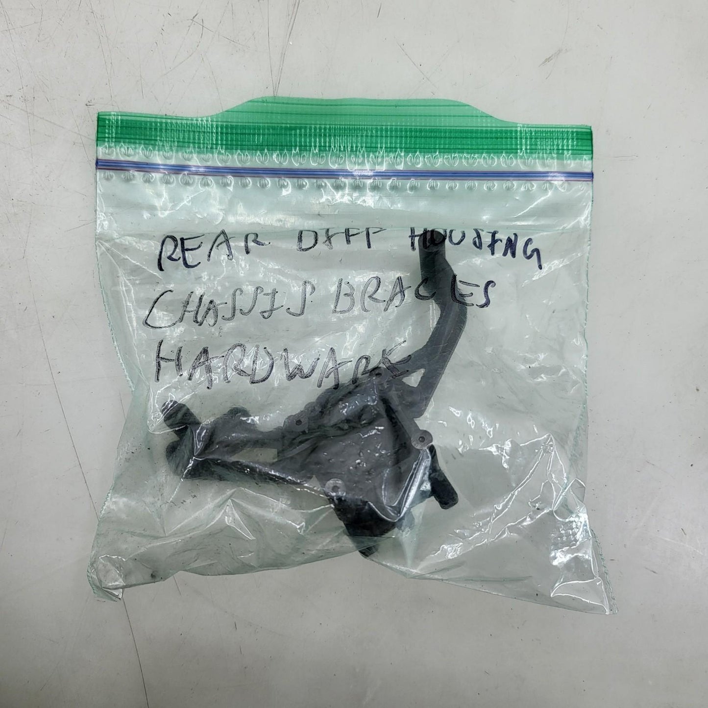 Team Associated Nitro TC3 rear diff housing, chassis mount, hardware