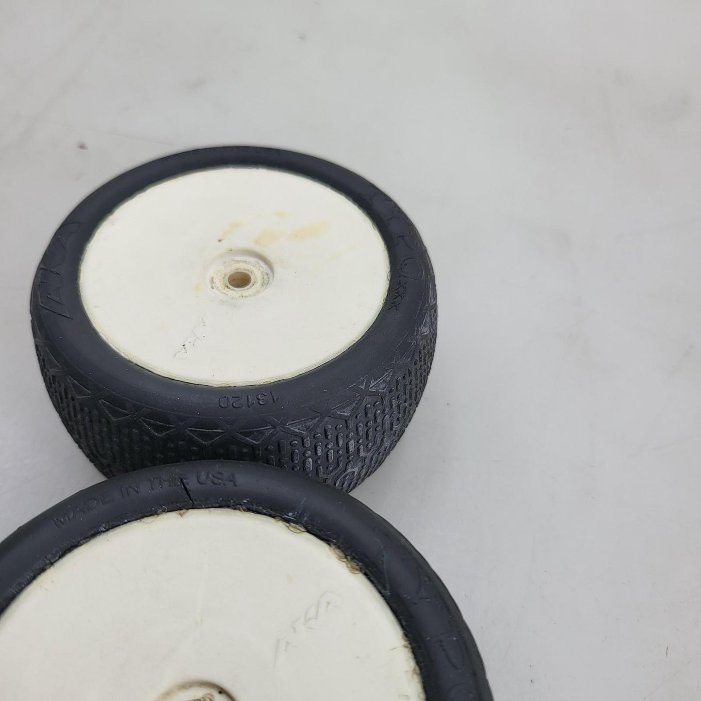 AKA Typo 1/10 buggy tires #13120 on white wheels