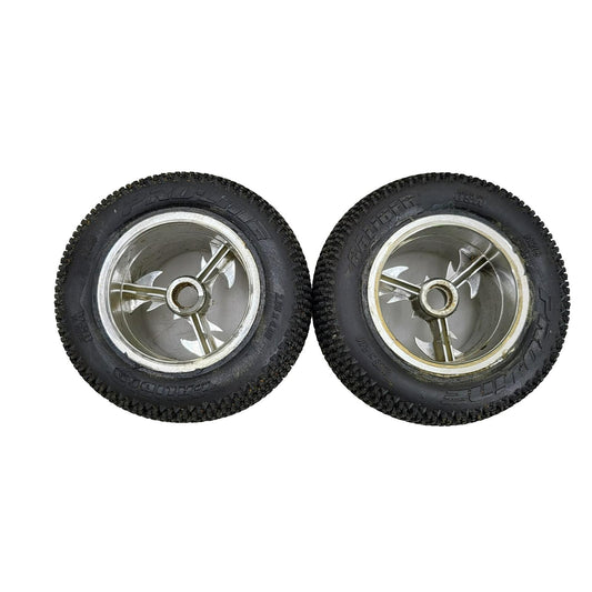 Proline caliber tires on unique old school tri-spoke wheels 1/8th scale