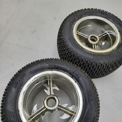 Proline caliber tires on unique old school tri-spoke wheels 1/8th scale
