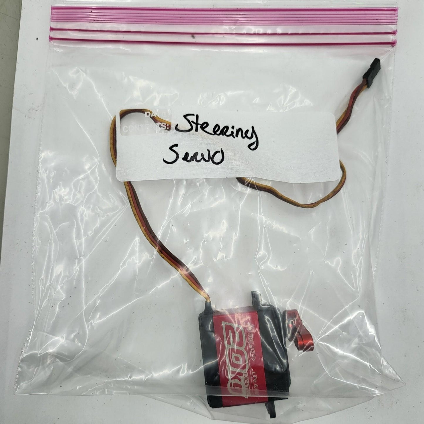 Power HD LF-20MG Servo with red aluminum horn, removed from Revo