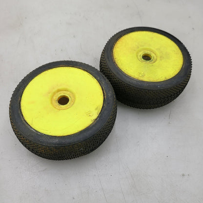 Team Losi yellow buggy wheels  1/8 on taper pin tires, one has flat spot, 17mm