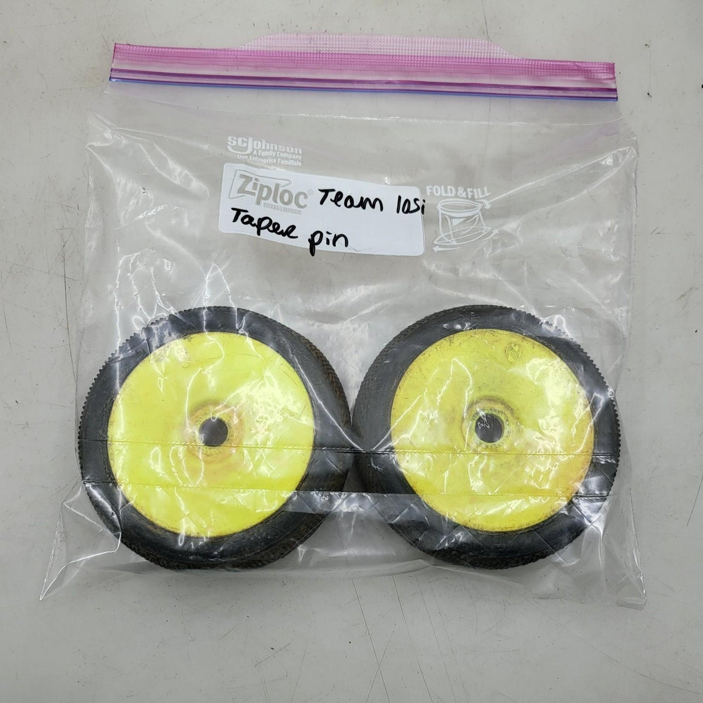 Team Losi yellow buggy wheels  1/8 on taper pin tires, one has flat spot, 17mm