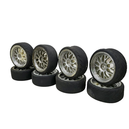 1/10th scale street wheels with variously worn tires, x8