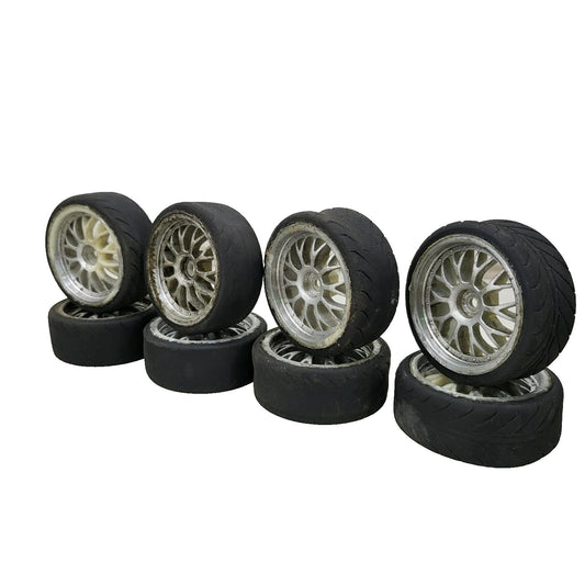1/10th scale street wheels with variously worn tires, x8