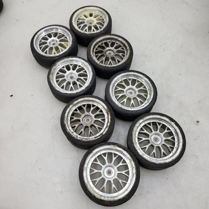 1/10th scale street wheels with variously worn tires, x8