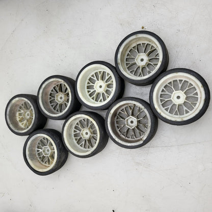 1/10th scale street wheels with variously worn tires, x8