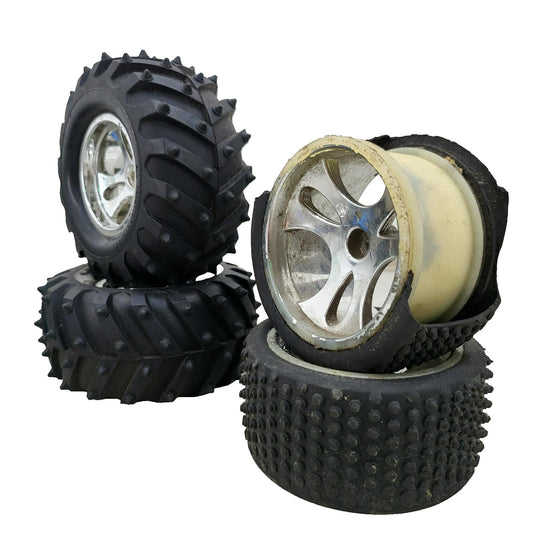 1/8 wheels, 2 blown out 2 in very good condition Losi step pin