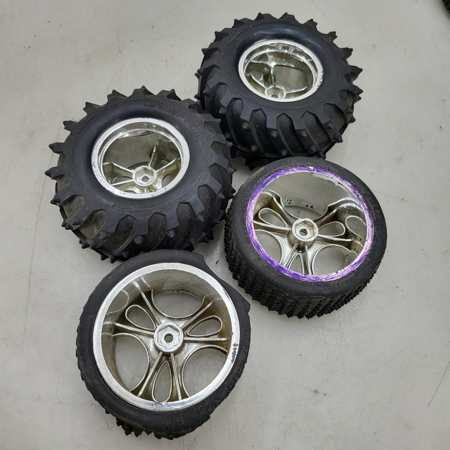 1/8 wheels, 2 blown out 2 in very good condition Losi step pin