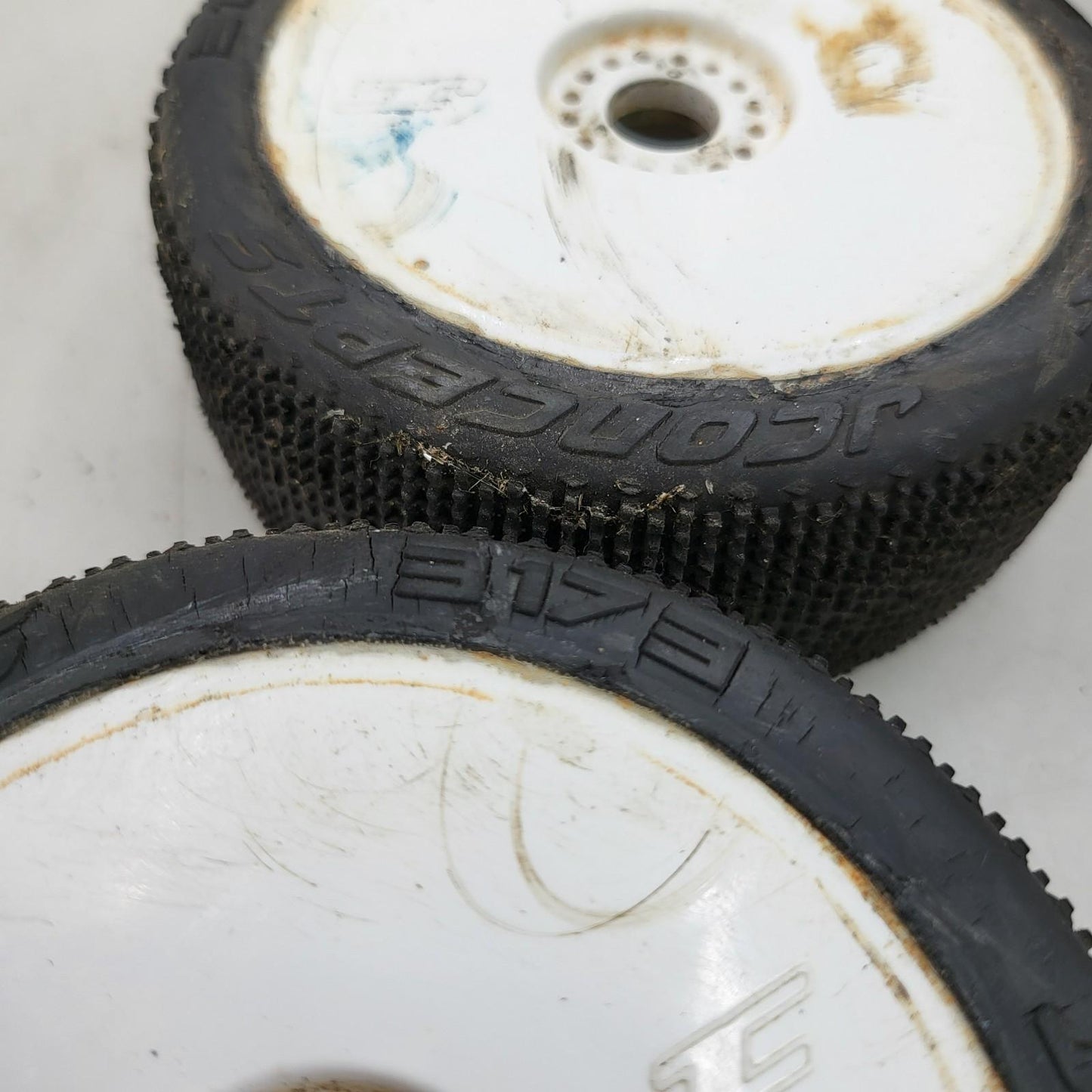 Jconcepts white 1/8th buggy wheels on teazer tires x2