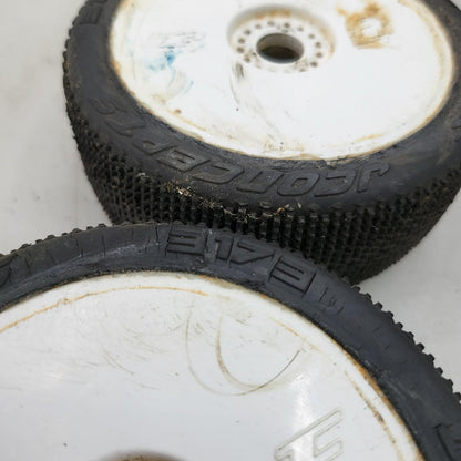 Jconcepts white 1/8th buggy wheels on teazer tires x2