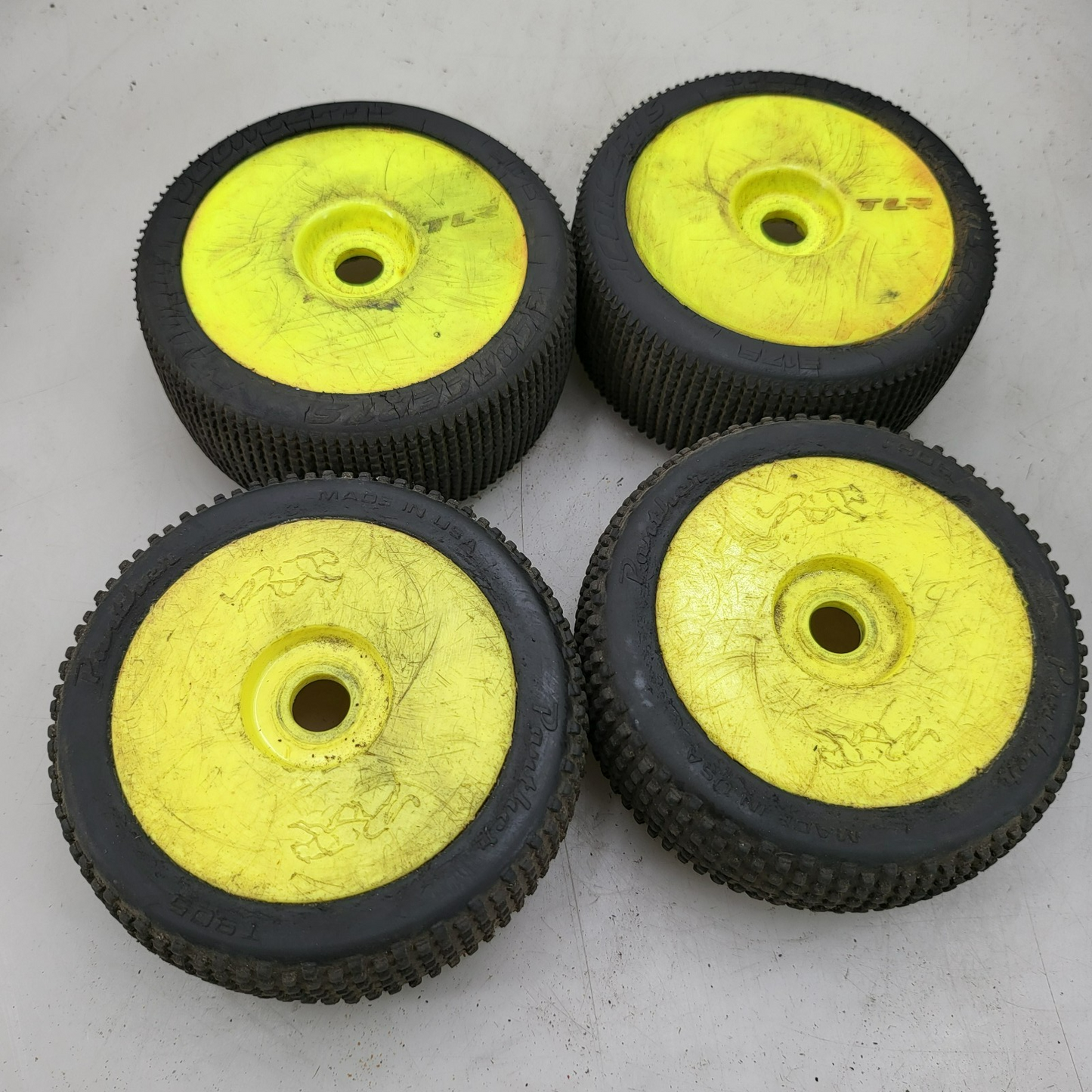 x4 1/8 yellow buggy wheels, team losi and panther, two different treads