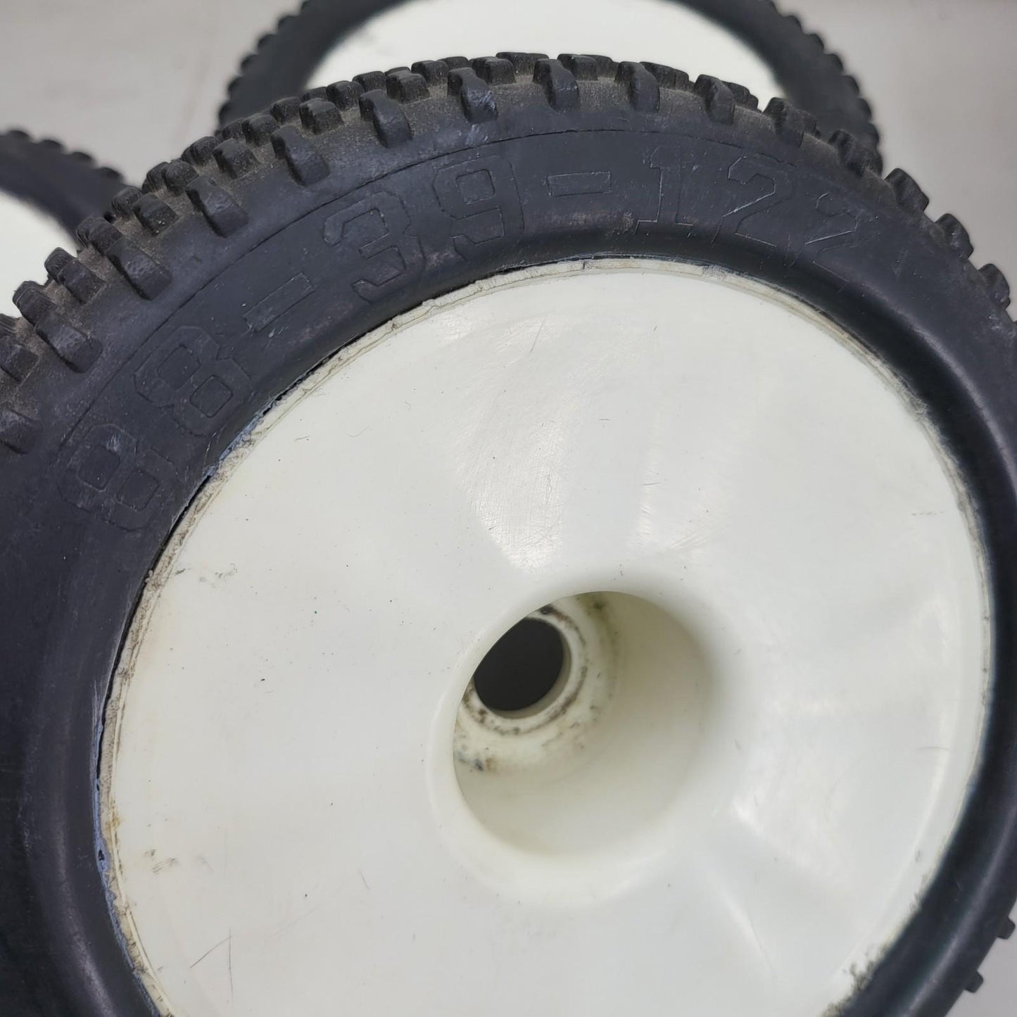 Cen Racing 88-39-122 "Sniper" tires on white buggy wheels  1/8, 1/7 x3