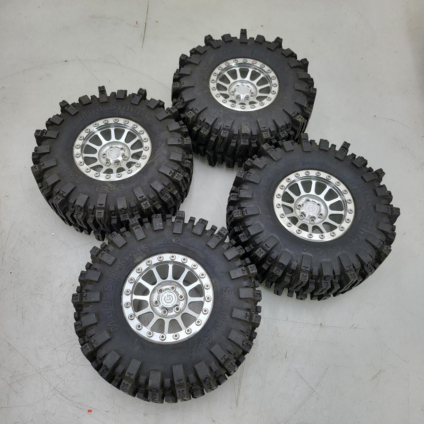 X4 Mud slinger 2.2 tires 4x4 on billet aluminum weighted GL wheels 1/10th SCX10