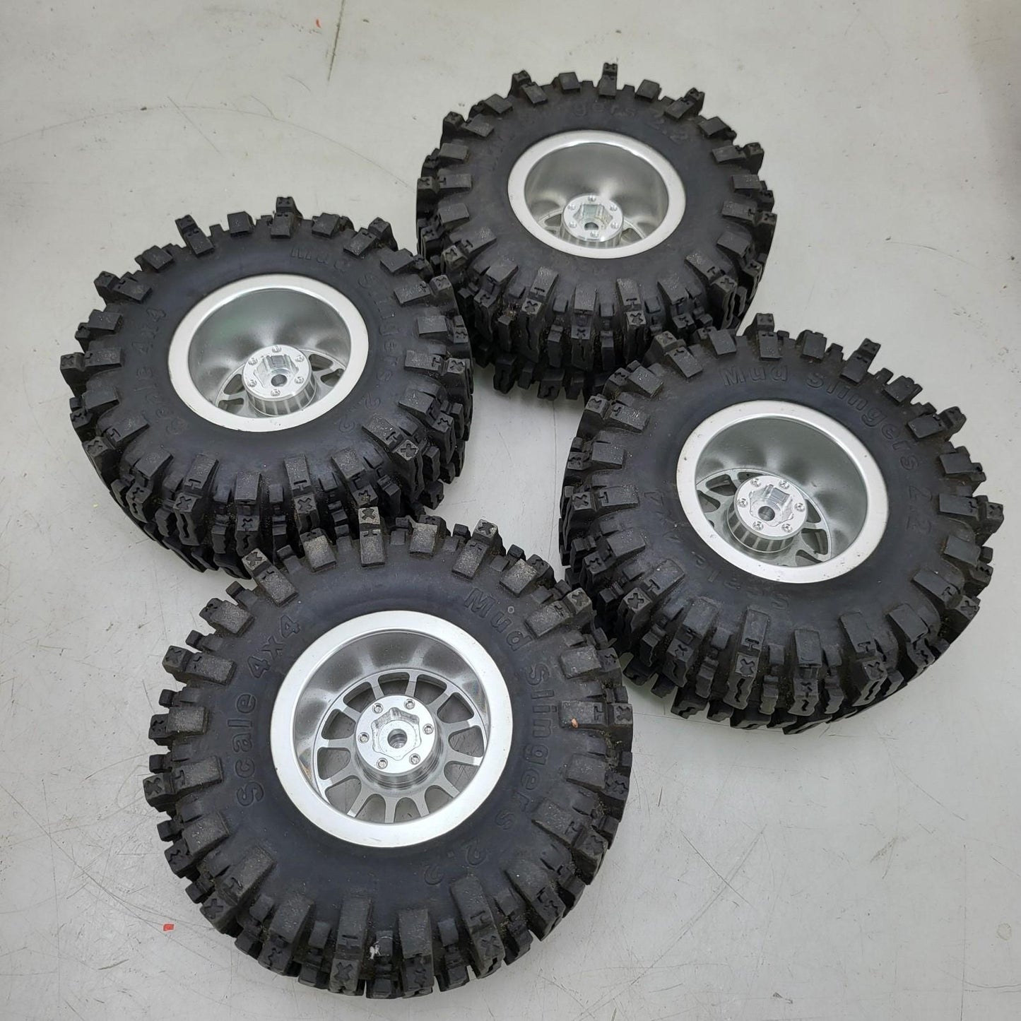 X4 Mud slinger 2.2 tires 4x4 on billet aluminum weighted GL wheels 1/10th SCX10