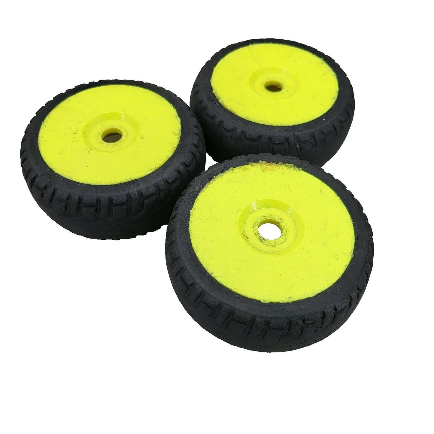 X3 1/10th scale yellow buggy wheels on worn unbranded tires