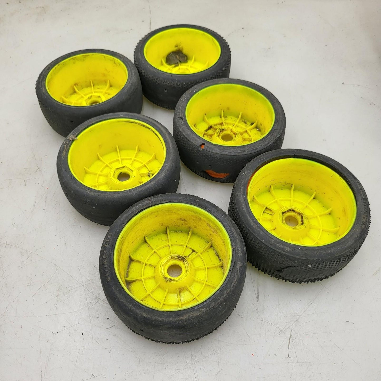 X6 1/10Th scale yellow buggy wheels, 2 different treads VP-PRO, worn