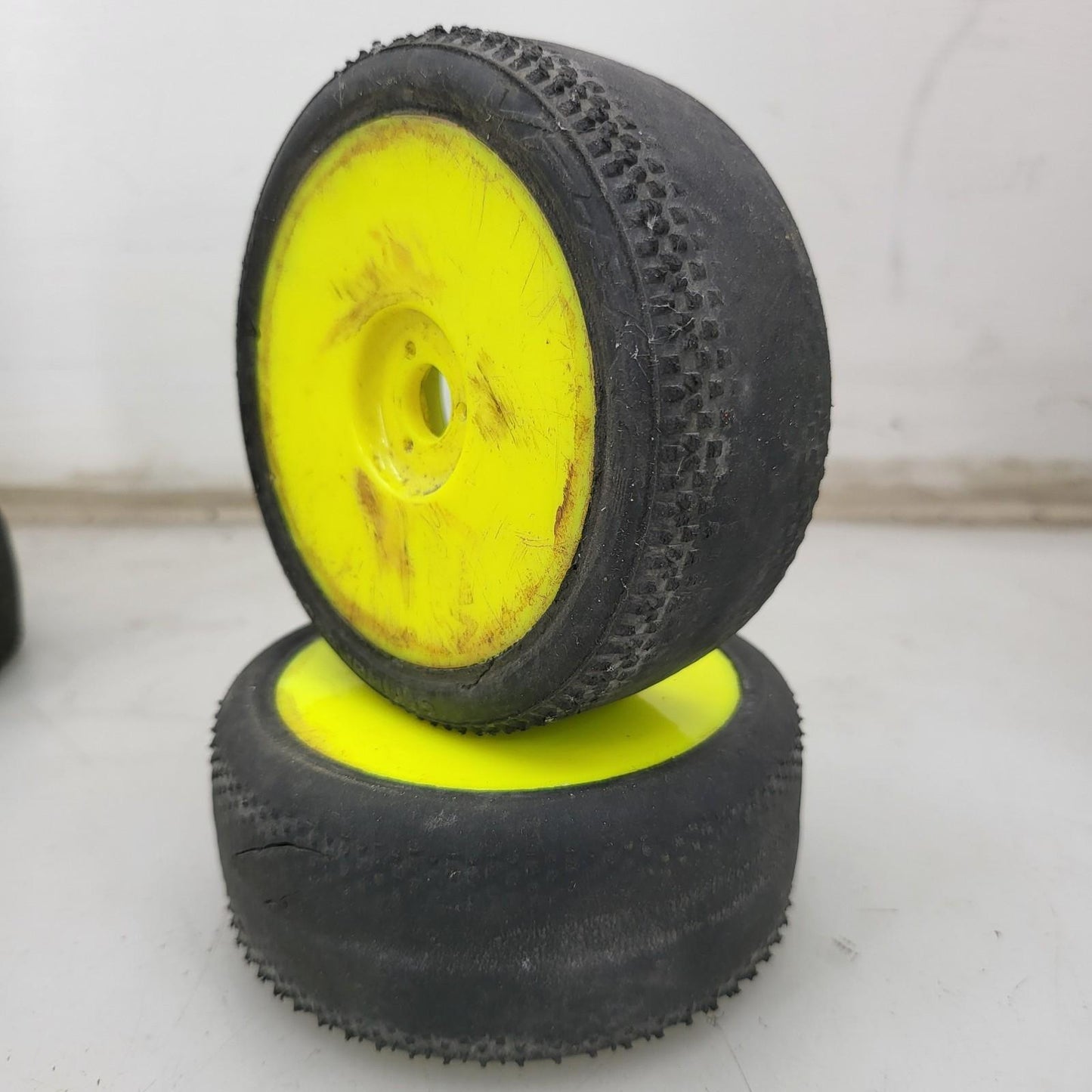 X6 1/10Th scale yellow buggy wheels, 2 different treads VP-PRO, worn