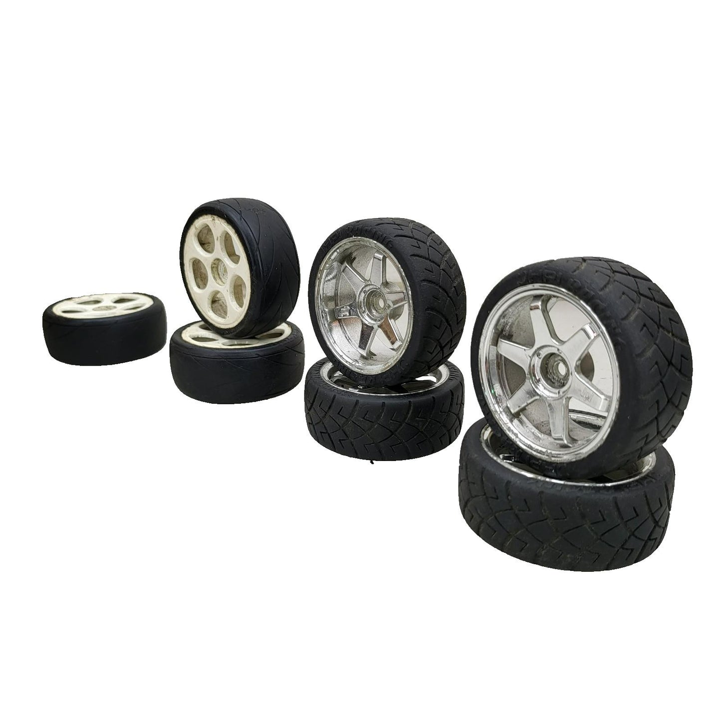 X7 1/10th scale wheels, V-rage tires on 3, HPI on the other 4