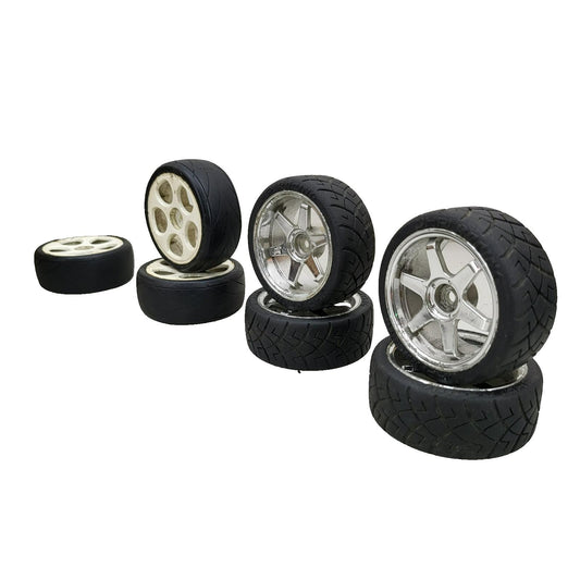 X7 1/10th scale wheels, V-rage tires on 3, HPI on the other 4