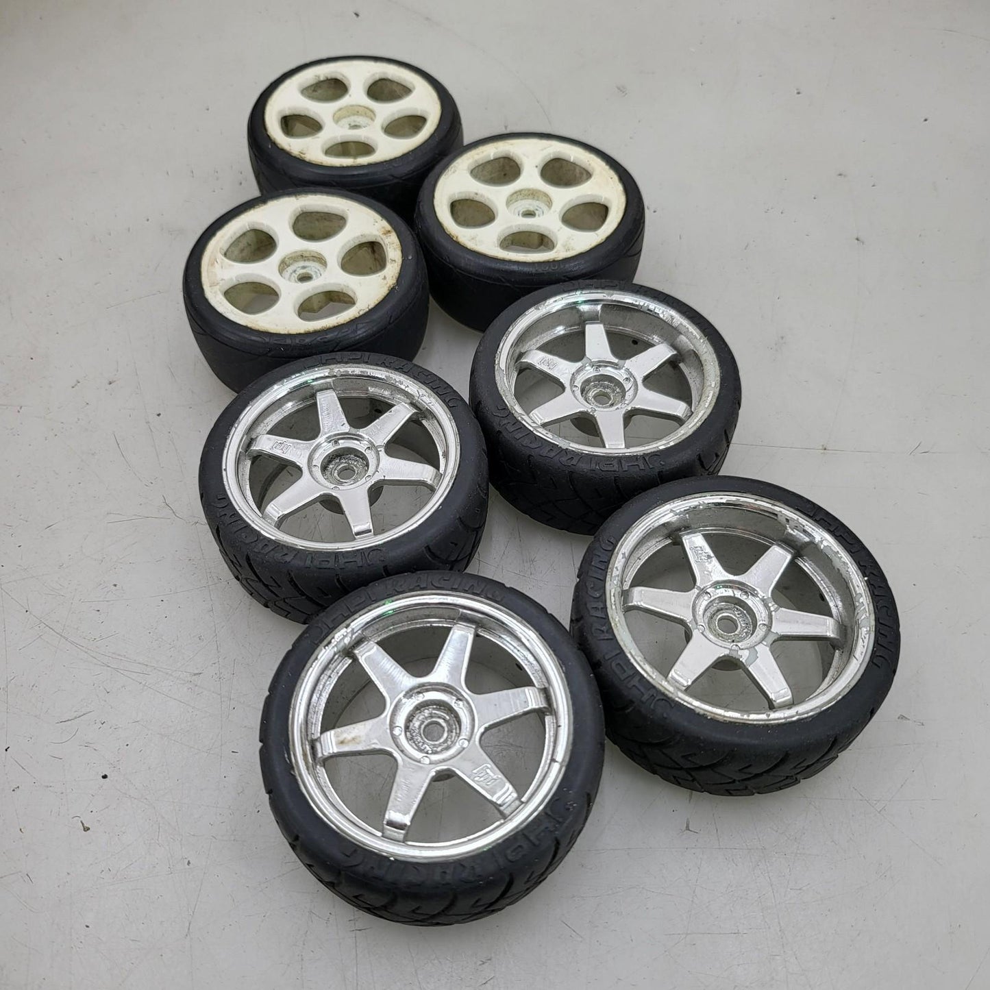 X7 1/10th scale wheels, V-rage tires on 3, HPI on the other 4
