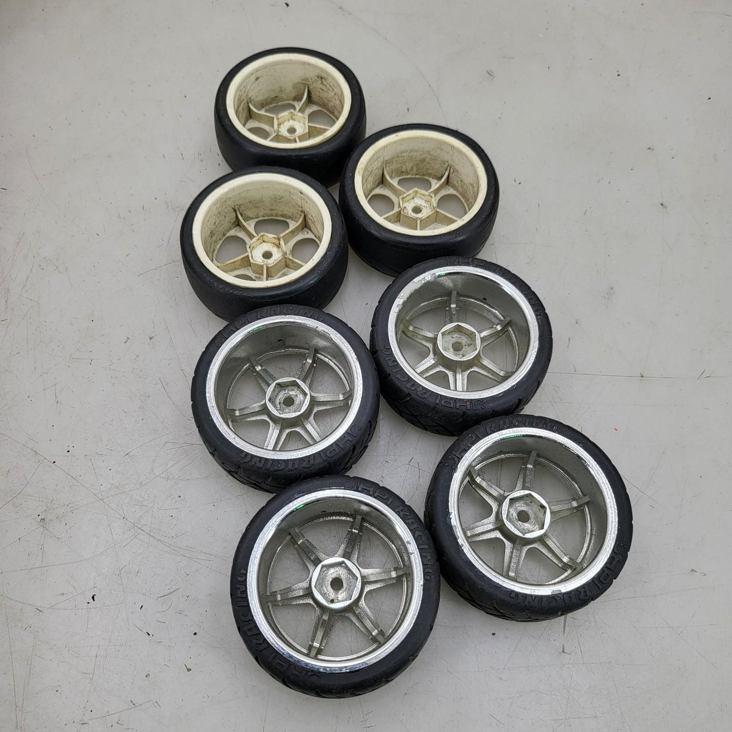 X7 1/10th scale wheels, V-rage tires on 3, HPI on the other 4