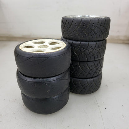 X7 1/10th scale wheels, V-rage tires on 3, HPI on the other 4