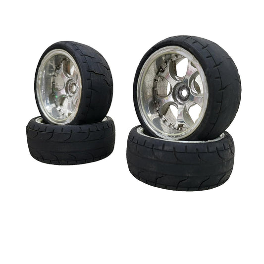 1/10th scale wheels removed from HPI Sprint 2, worn tires
