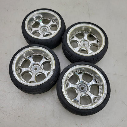 1/10th scale wheels removed from HPI Sprint 2, worn tires