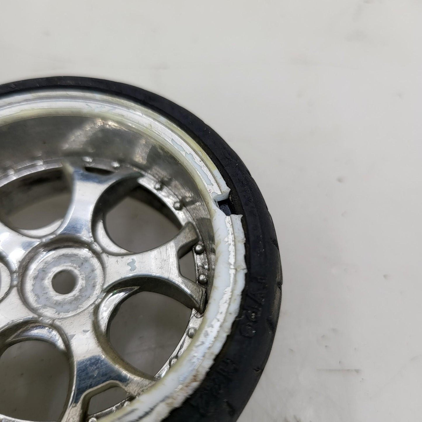 1/10th scale wheels removed from HPI Sprint 2, worn tires