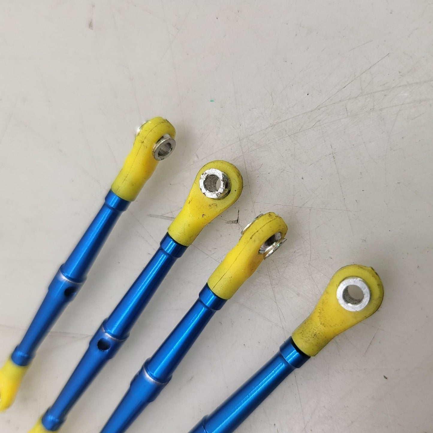 Team Associated Nitro TC3 Blue aluminum turnbuckles with yellow ends x4
