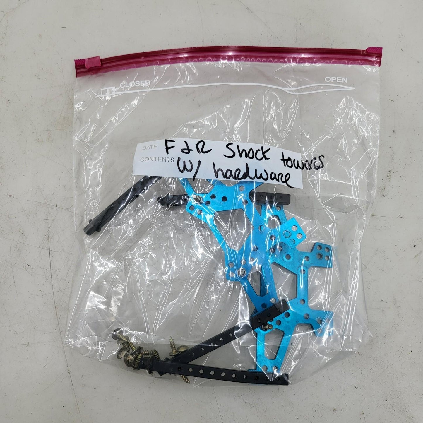 Duratrax Nitro Quake front and rear shock towers with body posts and hardware