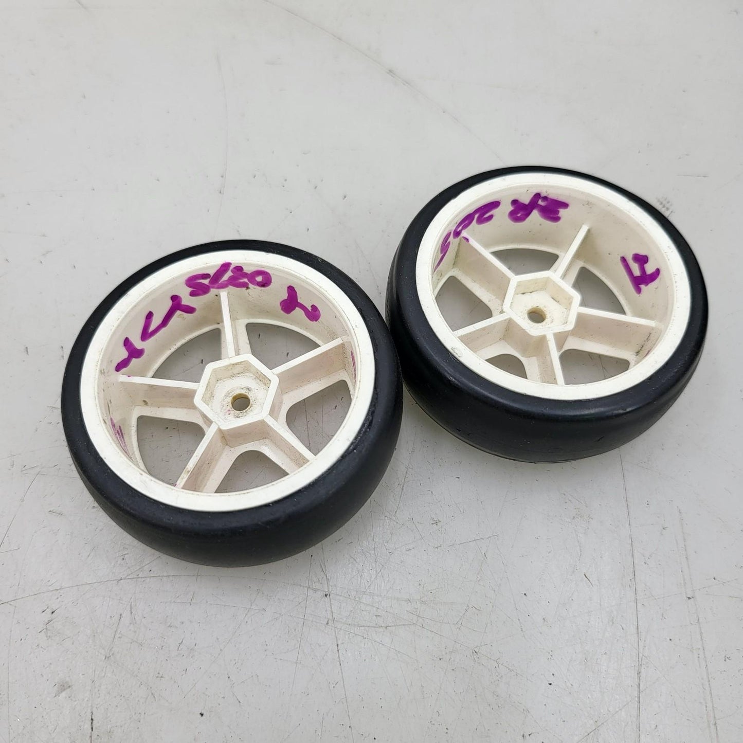 Proline Hot lap 1/10th scale tires on white multi-spoke tires, x2