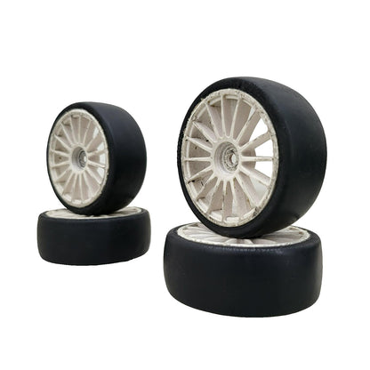 Tamiya 1/10th scale slicks, set of 4. 12mm hex on white multi spoke wheels