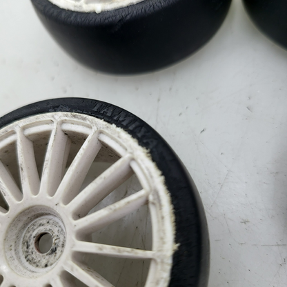 Tamiya 1/10th scale slicks, set of 4. 12mm hex on white multi spoke wheels
