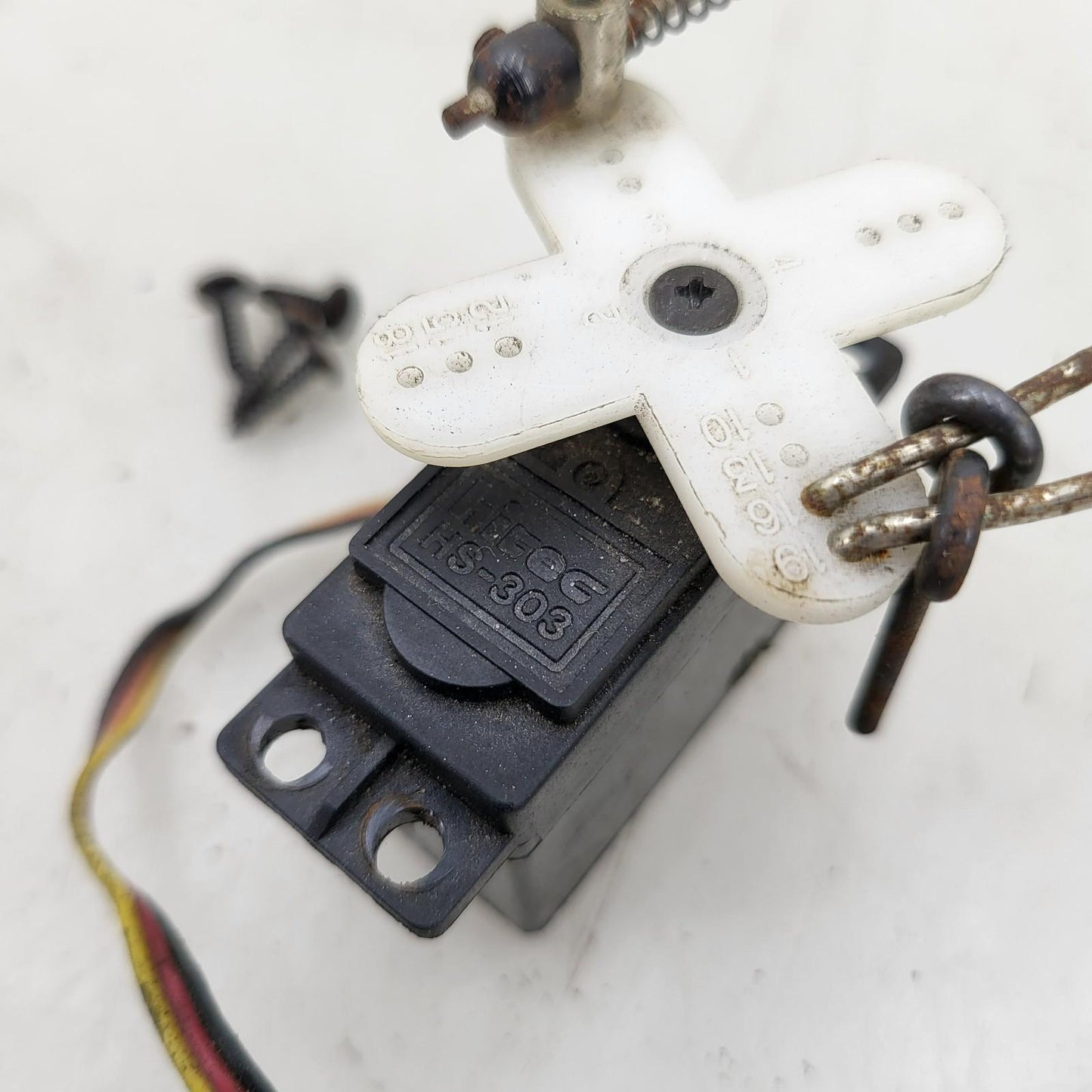 Hitec HS-303 throttle and braking servo removed from Duramax nitro Quake