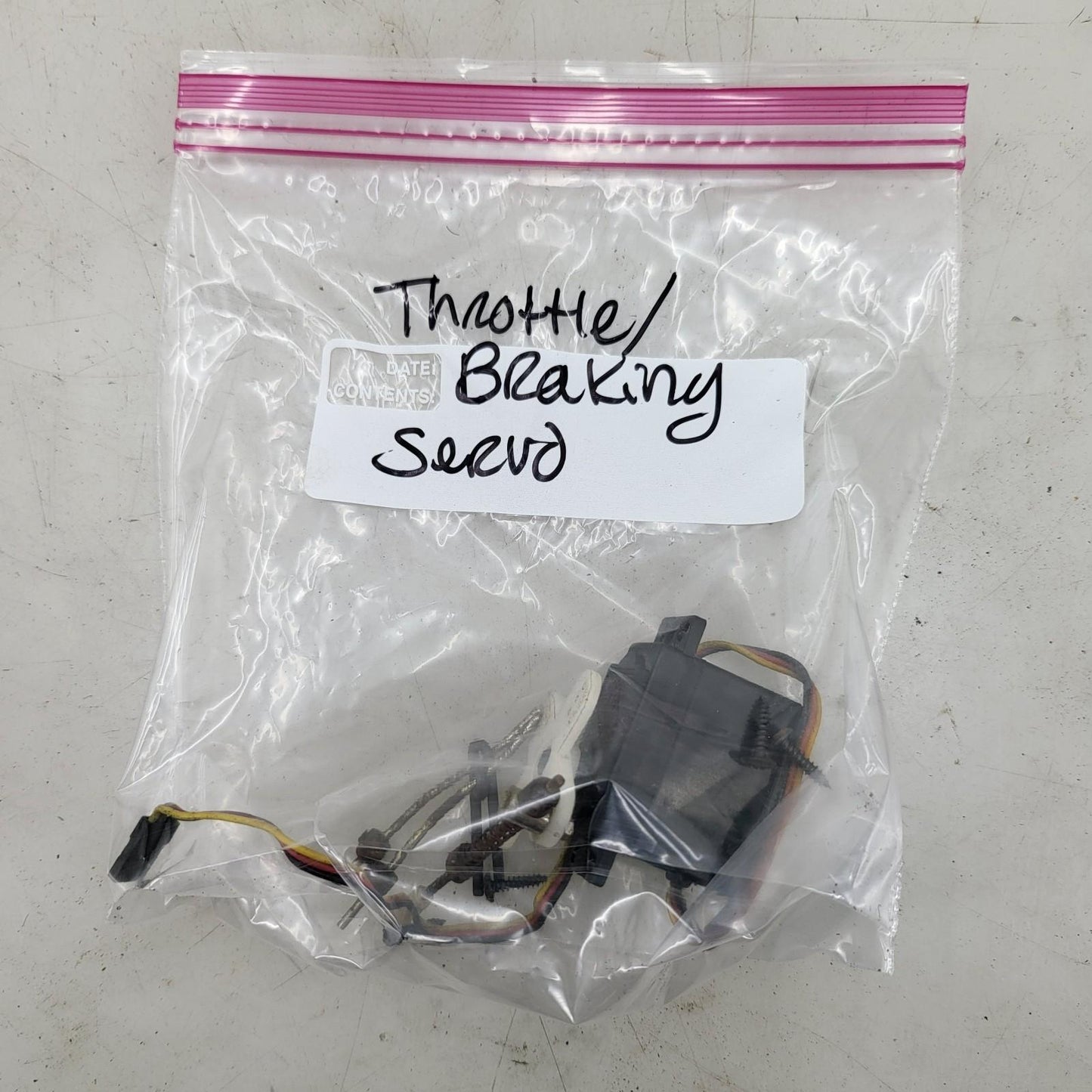 Hitec HS-303 throttle and braking servo removed from Duramax nitro Quake