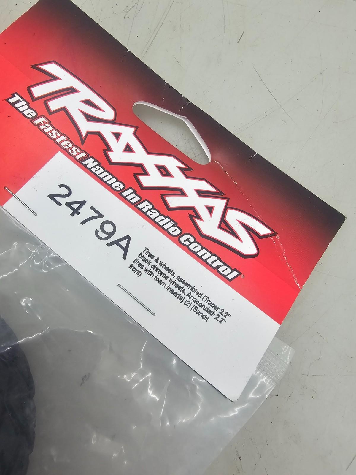 Traxxas Anaconda tires with foam inserts on black chrome wheels for bandit front