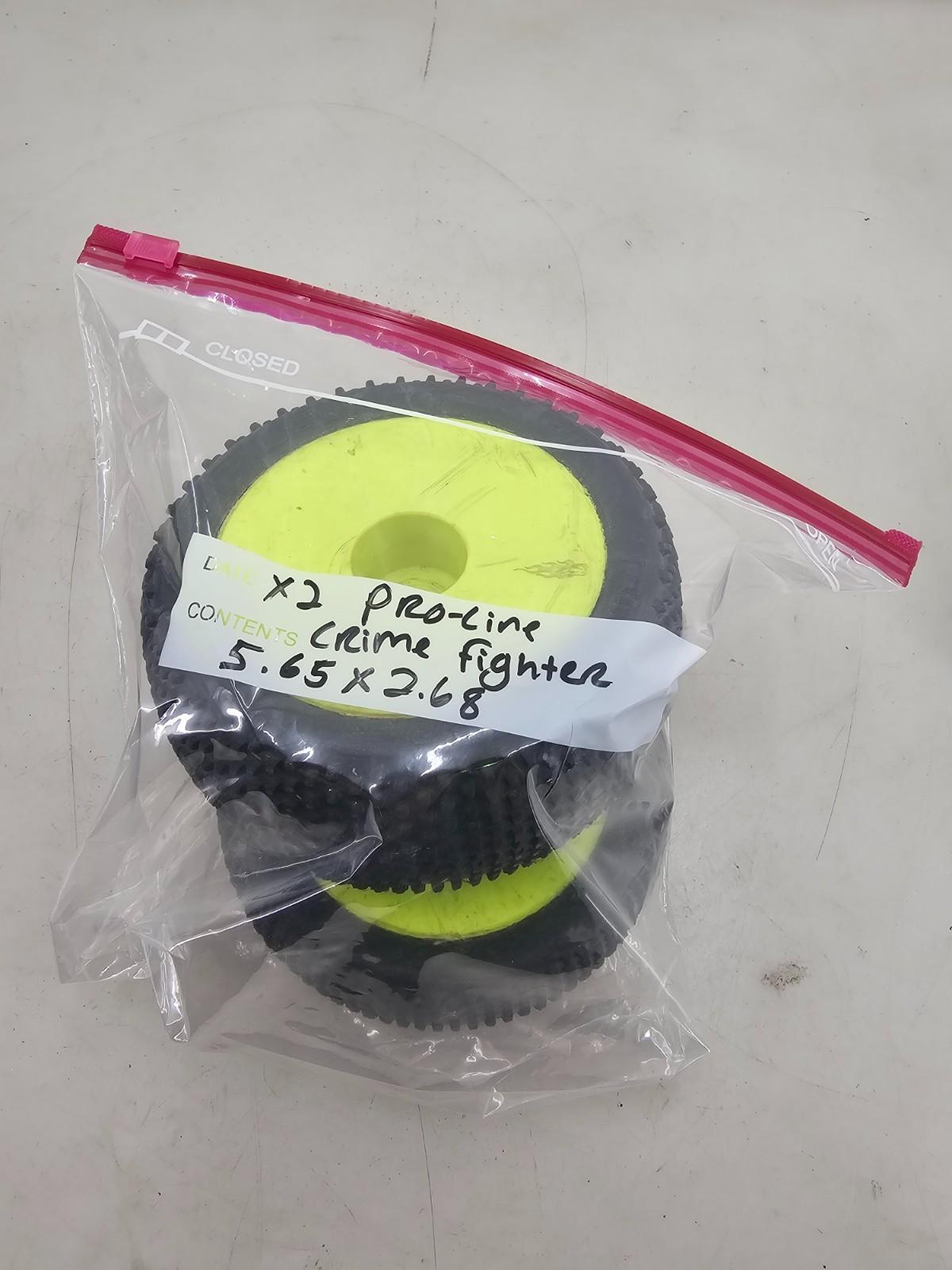 Pro-Line Crime Fighters on yellow disc wheels pair of 2 5.65X2.68