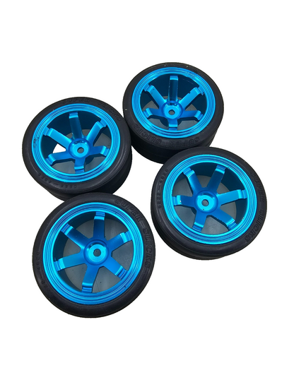 Very nice 1/10th scale blue aluminum 6 spoke TE37 wheels w/ super slicks