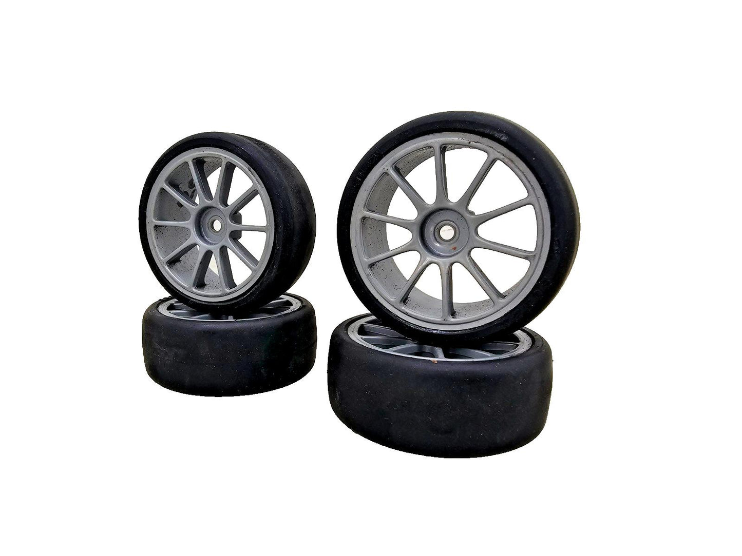1/10th scale Yokomo Sorex tires on multi spoke light grey wheels, set of four