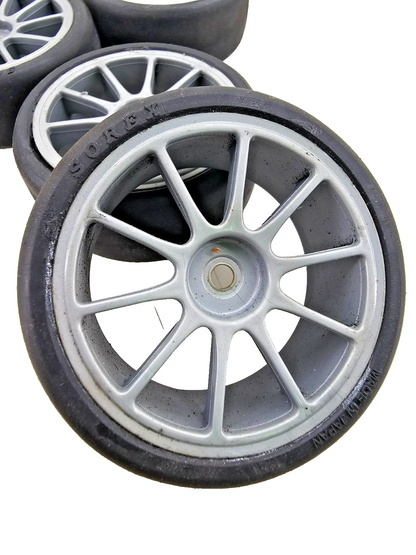 1/10th scale Yokomo Sorex tires on multi spoke light grey wheels, set of four