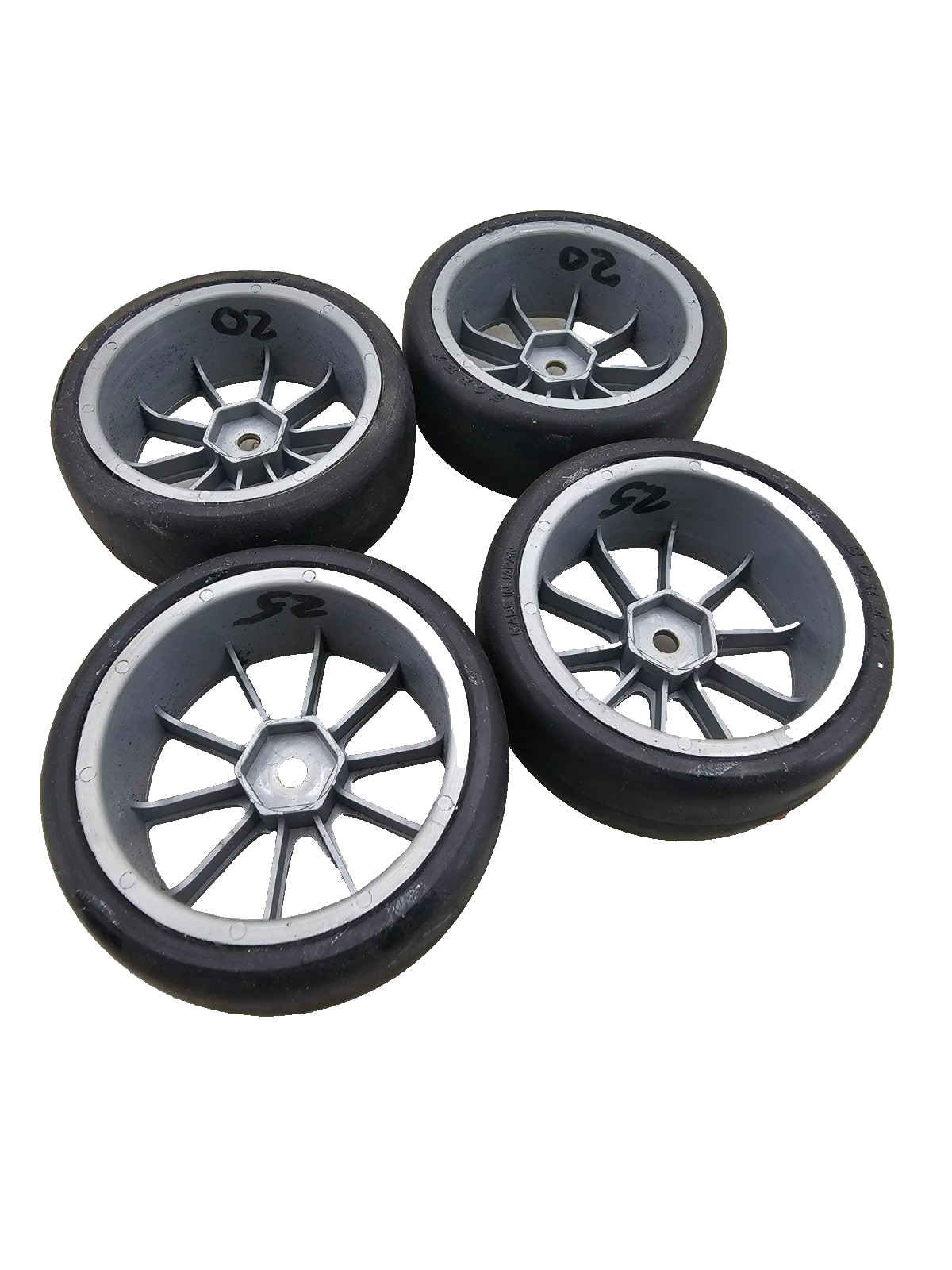 1/10th scale Yokomo Sorex tires on multi spoke light grey wheels, set of four