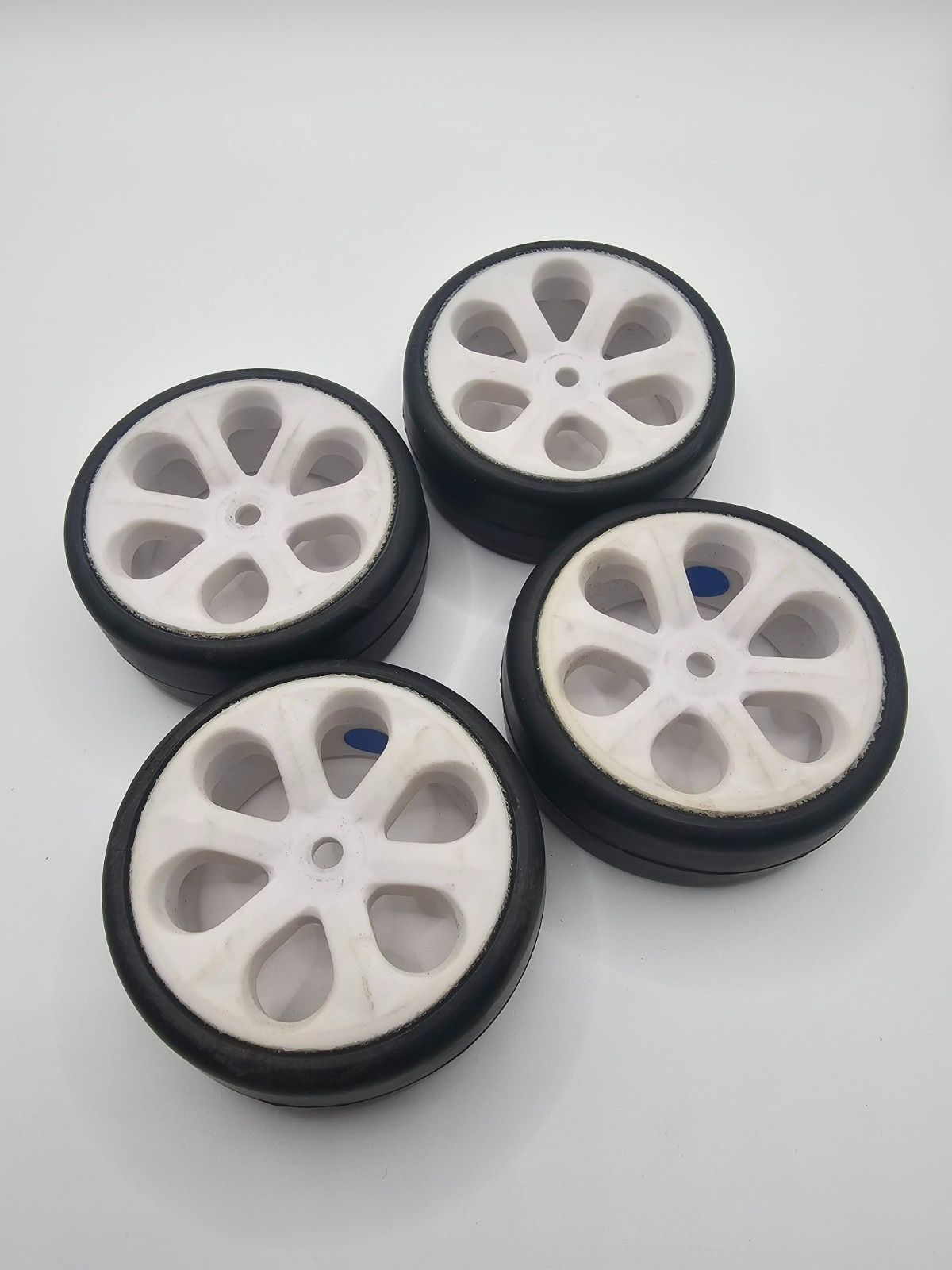 Jaco Foam 1/10 tires , blue compound, on 12mm hex white wheels. Mounted, unused.