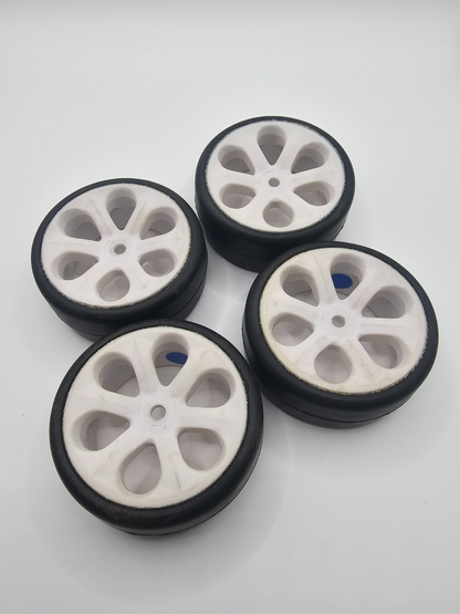 Jaco Foam 1/10 tires , blue compound, on 12mm hex white wheels. Mounted, unused.