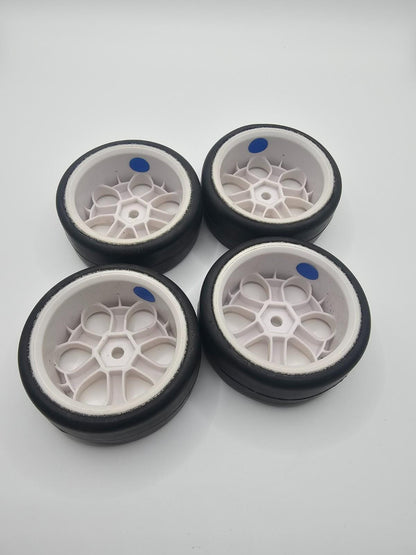 Jaco Foam 1/10 tires , blue compound, on 12mm hex white wheels. Mounted, unused.